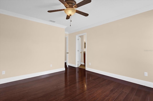 spare room with ceiling fan, dark wood-type flooring, and ornamental molding