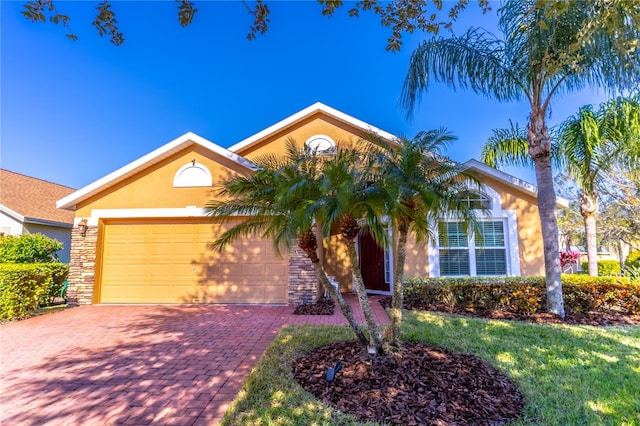 view of front of property with a garage