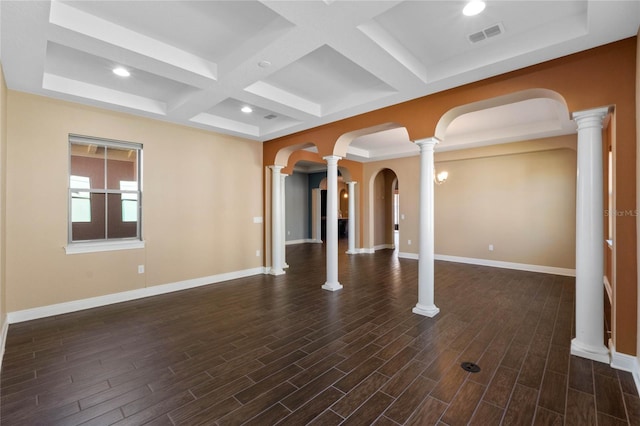 unfurnished room featuring decorative columns