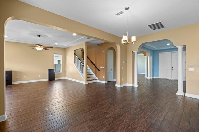 unfurnished room with ceiling fan and ornate columns