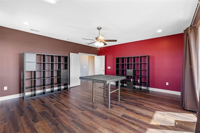 playroom featuring ceiling fan and dark hardwood / wood-style flooring