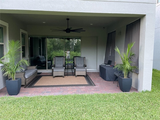 view of patio / terrace featuring outdoor lounge area and ceiling fan