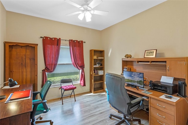 office space with ceiling fan and light hardwood / wood-style flooring