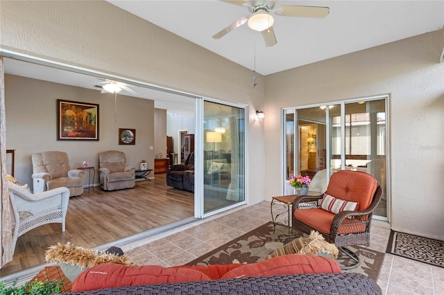 interior space featuring ceiling fan