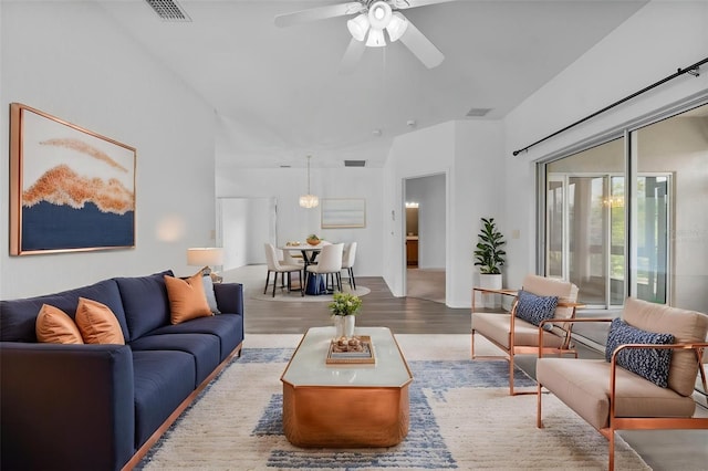 4112 Aberdeen Ln, Lake Wales, FL 33859 - living room with ceiling fan, wood finished floors, and a high ceiling
