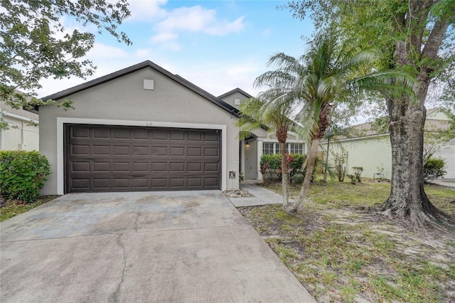 ranch-style home with a garage