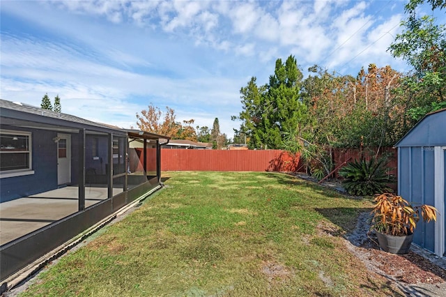 view of yard featuring a sunroom