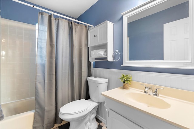 full bathroom with vanity, shower / bath combination with curtain, and toilet