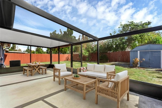 view of patio featuring a shed and an outdoor living space