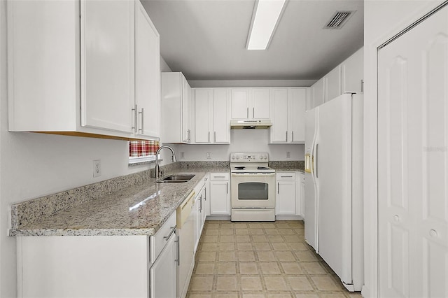 kitchen featuring white cabinetry, light stone countertops, white appliances, and sink