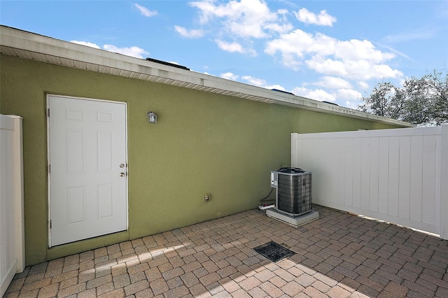 view of patio with central AC unit