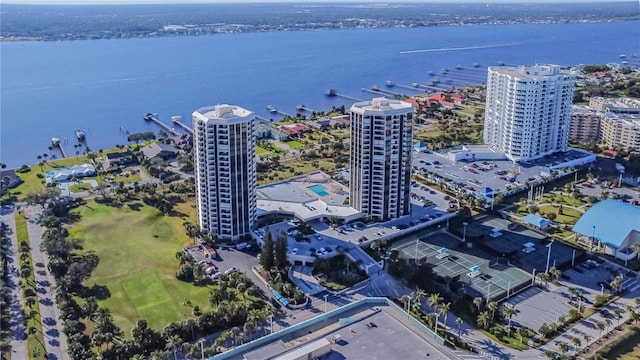 birds eye view of property with a water view