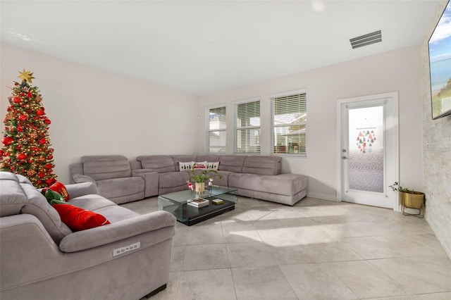 living room featuring light tile patterned floors