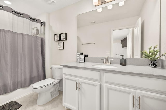 full bathroom featuring shower / bath combo, vanity, toilet, and tile patterned floors