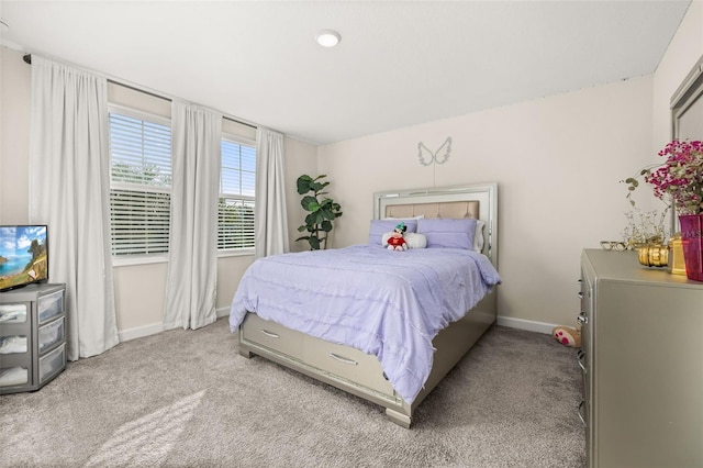 bedroom with light carpet