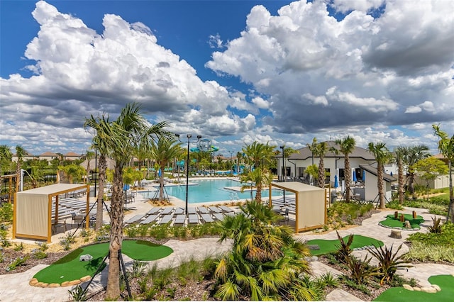 view of swimming pool with a patio area