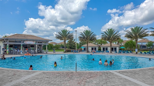 view of swimming pool featuring a patio