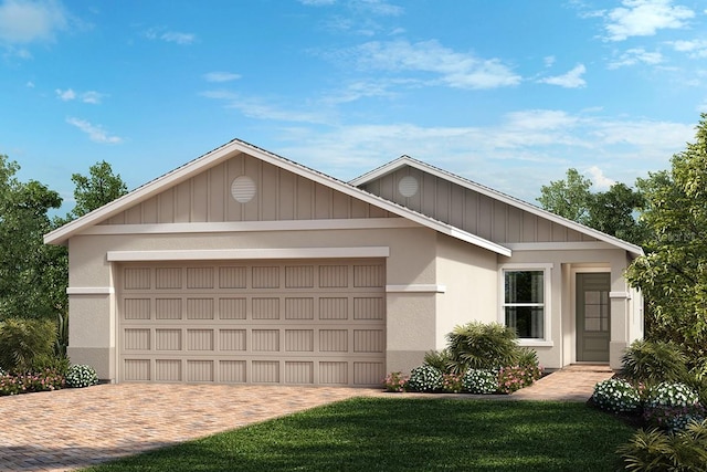 ranch-style house featuring a front yard and a garage