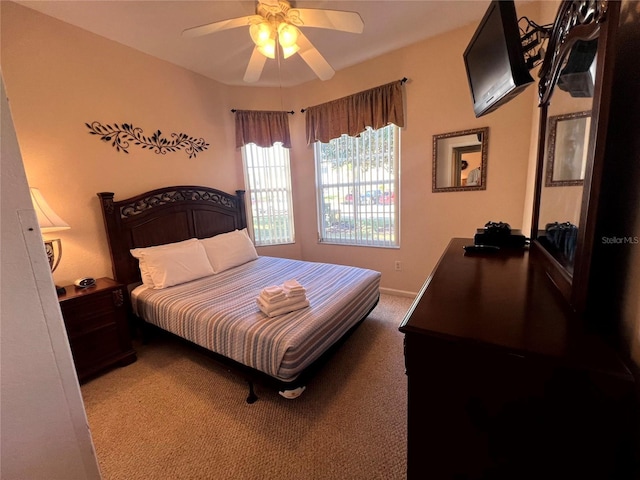 bedroom featuring carpet flooring and ceiling fan