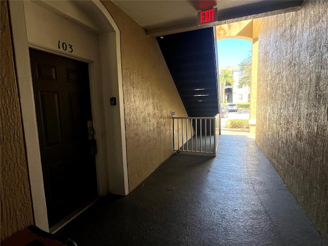 corridor with carpet flooring