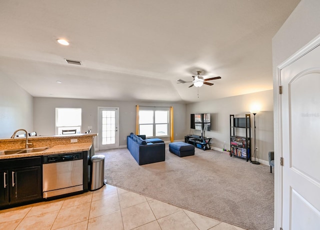 14308 Edinburgh Moor Dr, Wimauma, FL 33598 - living area with light carpet, a ceiling fan, and light tile patterned floors