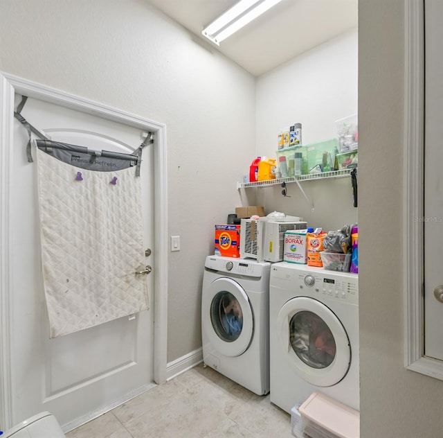 14308 Edinburgh Moor Dr, Wimauma, FL 33598 - laundry room featuring washer and dryer and light tile patterned flooring