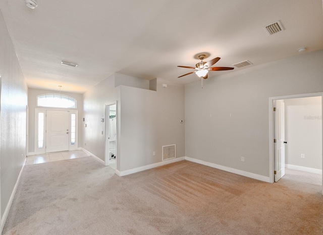 14308 Edinburgh Moor Dr, Wimauma, FL 33598 - foyer with light carpet and ceiling fan