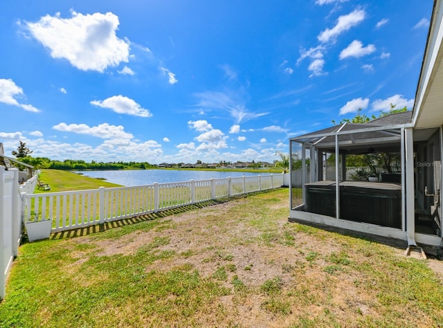 14308 Edinburgh Moor Dr, Wimauma, FL 33598 - fenced backyard with a water view, a hot tub, and a lanai