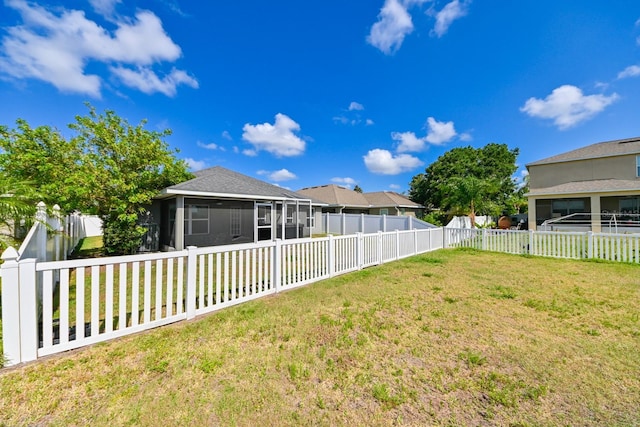 14308 Edinburgh Moor Dr, Wimauma, FL 33598 - fenced backyard featuring a sunroom