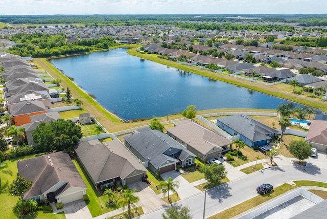 14308 Edinburgh Moor Dr, Wimauma, FL 33598 - aerial perspective of suburban area with a large body of water