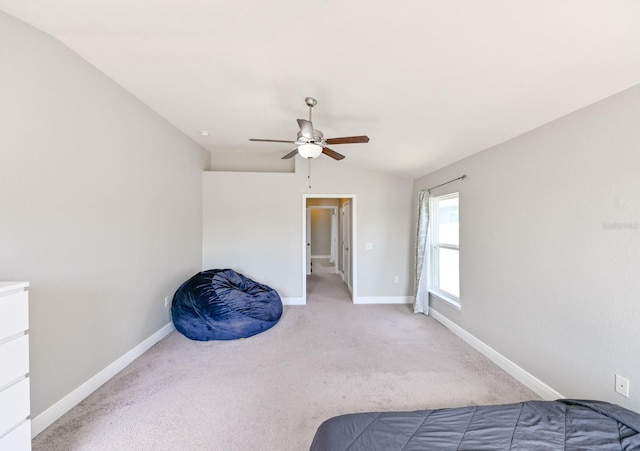 14308 Edinburgh Moor Dr, Wimauma, FL 33598 - unfurnished bedroom featuring carpet floors, vaulted ceiling, and ceiling fan