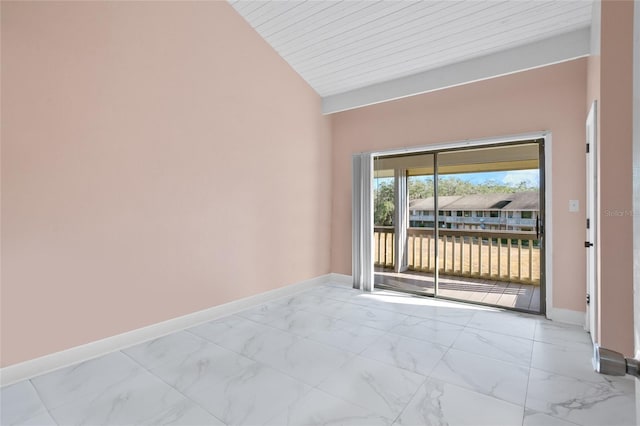 empty room featuring wood ceiling and lofted ceiling