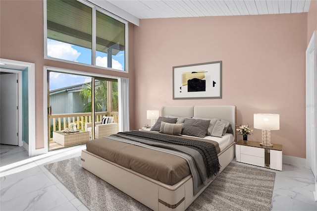 bedroom featuring high vaulted ceiling and wood ceiling