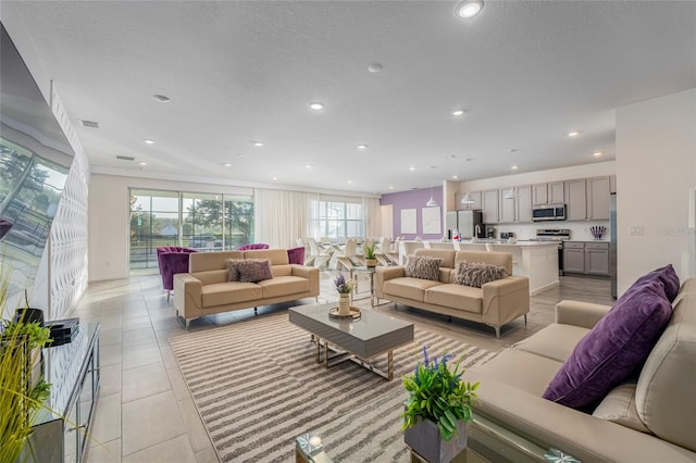 tiled living room with a textured ceiling