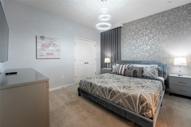 carpeted bedroom featuring a closet