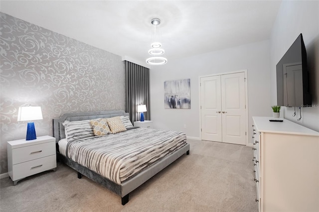 carpeted bedroom with a closet