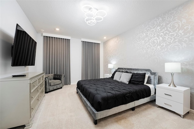 carpeted bedroom with a textured ceiling