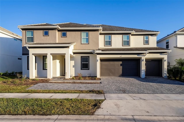 view of front of home with a garage