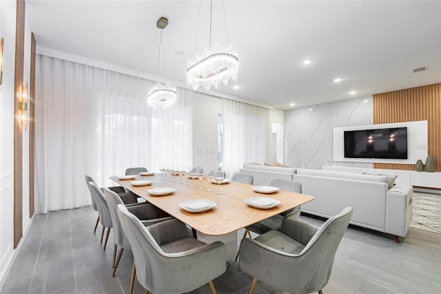 dining area with a notable chandelier