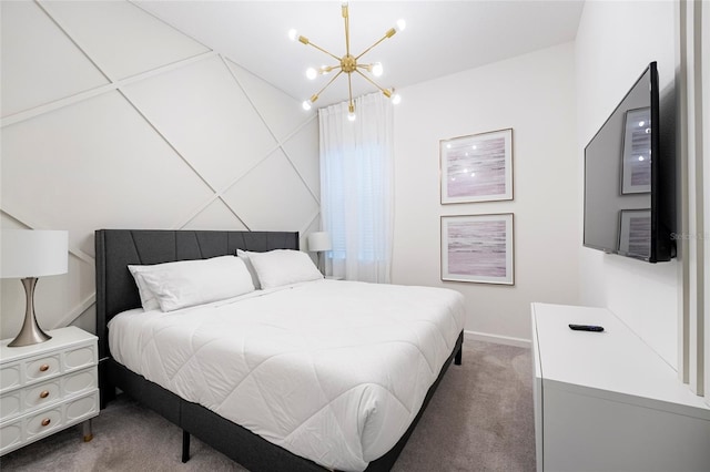 carpeted bedroom featuring a notable chandelier