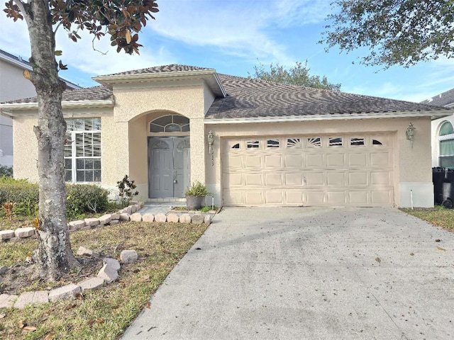 view of front of house with a garage