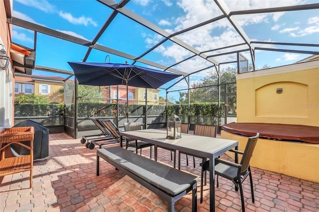 view of patio featuring a lanai and grilling area