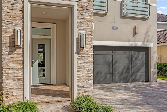 entrance to property with a garage