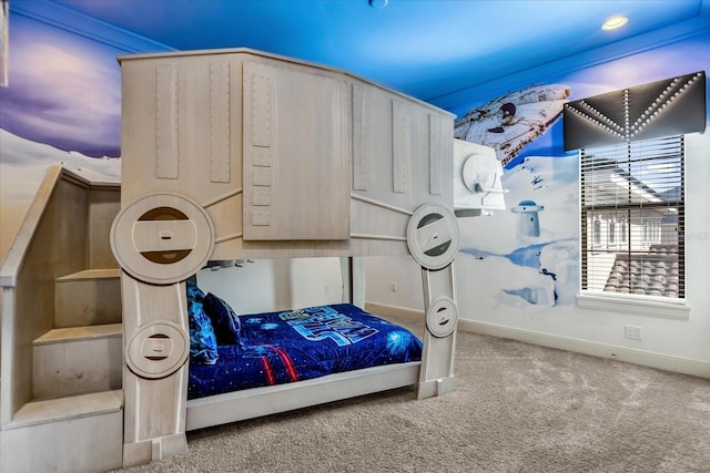 carpeted bedroom featuring ornamental molding