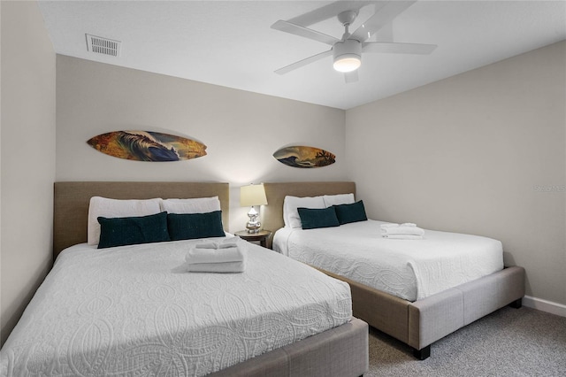 bedroom with ceiling fan and carpet