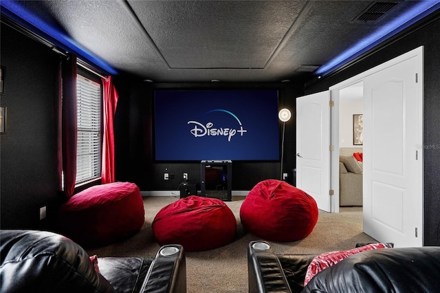 home theater with a textured ceiling