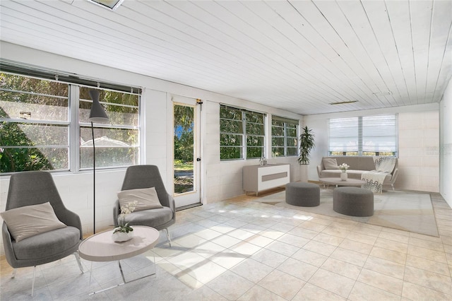 sunroom / solarium featuring wood ceiling