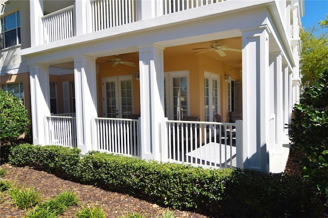 view of side of property with ceiling fan