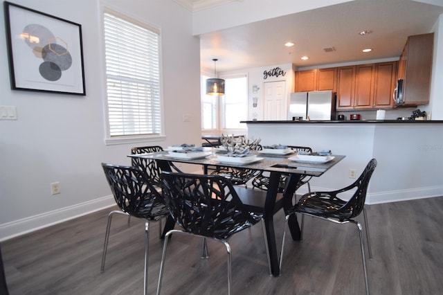 dining room featuring dark wood-type flooring