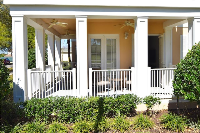 view of exterior entry featuring ceiling fan